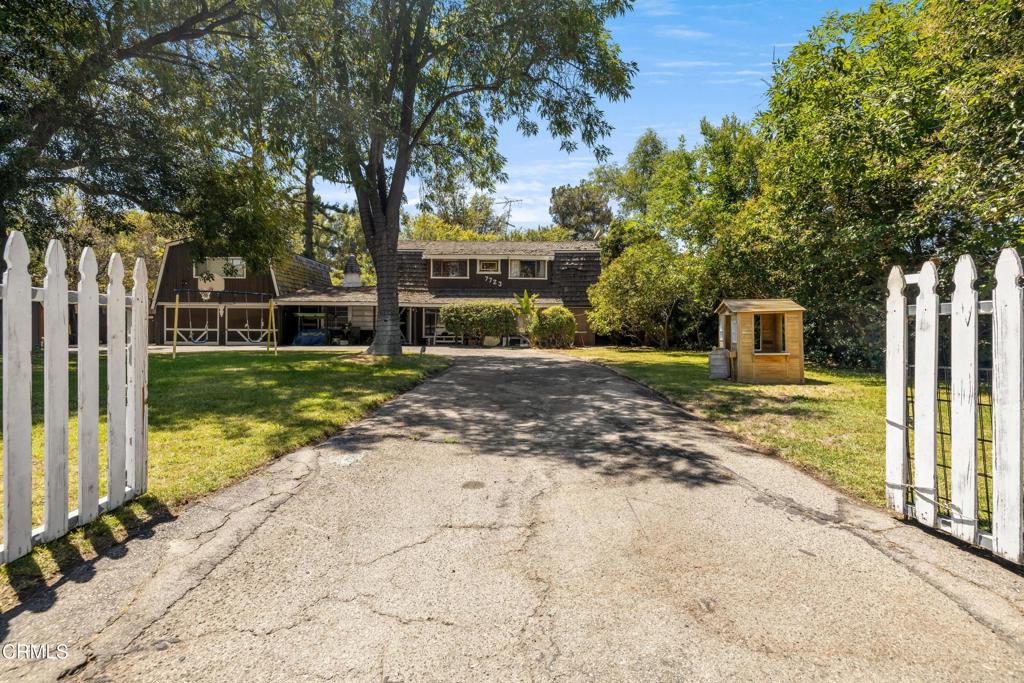 Charming Ranch-Style Home in North Hollywood! This spacious 4-bedroom, 5-bathroom ranch-style home sits on over half an acre and offers comfort, privacy, and character. A long circular driveway leads you to a warm and inviting home with wood details, stained glass, and large windows. Inside, enjoy a bright living room, a cozy family room with fireplace, and a kitchen with plenty of storage. There's one bedroom downstairs and three upstairs, including a large primary suite with its own balcony and fireplace. A bonus room above the garage is perfect for guests, an office, or extra living space. The backyard feels like a private retreat with bamboo plants, a koi pond, waterfall, and a peaceful wood deck. Located on a quiet street with quick access to the 170 freeway, restaurants, and shops. This is a unique rental that blends charm, space, and serenity in the heart of the Valley.
