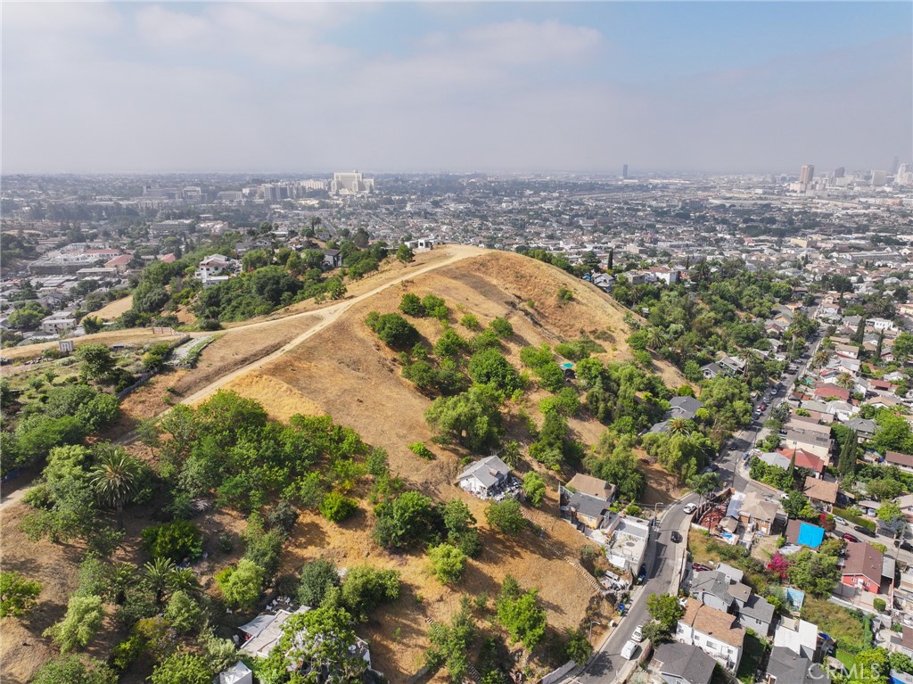 Beautiful lot with amazing views and potential is there. Please verify all building and land information with the proper Government departments.