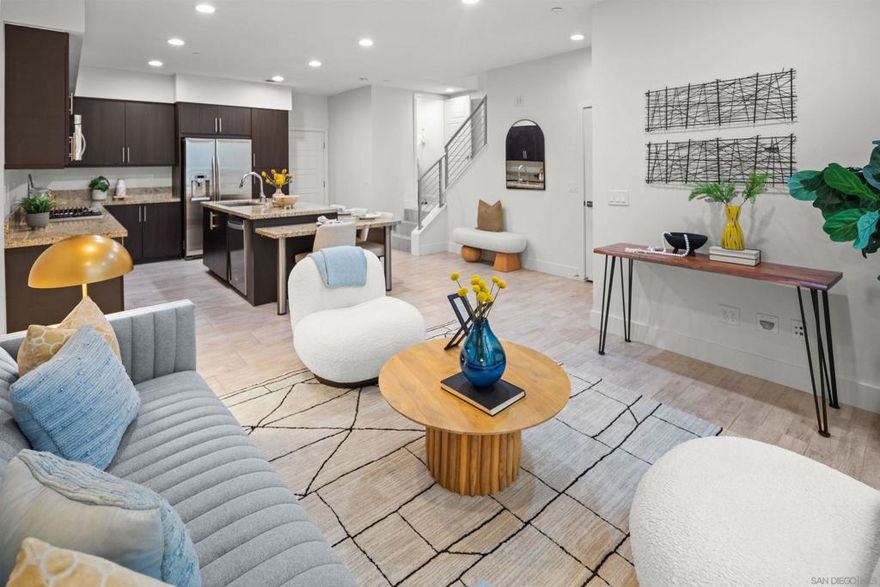 Priced to sell! This beautifully updated three-bedroom, two-and-a-half-bathroom home at Frame & Focus offers 1,470 sq. ft. of stylish living in a light-filled, move-in-ready setting. Perfect for those looking for a fantastic opportunity, this residence combines comfort, value, and a prime Mission Valley location.  Step inside to find upgraded flooring throughout the main level and brand-new carpet upstairs. The open-concept layout features a modern kitchen with island seating, ideal for both casual meals and entertaining. Freshly painted throughout, the home feels bright, clean, and ready for its next chapter.  Upstairs, you’ll find a spacious primary suite with abundant natural light, a large bathroom, and a walk-in closet. A full walk-in laundry room and plenty of hallway storage add everyday convenience.  Just steps away are community amenities including a pool, jacuzzi, and lounge area with a fireplace—perfect for relaxing or hosting friends.  This is a rare opportunity to own a turnkey home in Frame & Focus, thoughtfully updated and priced to move.  Civita is one of Mission Valley’s most sought-after communities, known for its modern design, walkable layout, and unbeatable central location. Just minutes from the beach, downtown San Diego, and Snapdragon Stadium, Civita offers the perfect blend of city access and relaxed community living—all within a 15-minute drive. This vibrant neighborhood is packed with everyday conveniences and unique local spots. From LA Fitness and a neighborhood vet to casual dining, coffee shops, and boutique retail, everything you need is just steps away. At the heart of it all is Civita Park—a beautiful 14-acre space that features lush gardens, winding trails, basketball courts, amphitheaters, and open lawns for picnics or events. The nearby Civita Recreation Center adds even more with resort-style pools, a state-of-the-art gym, and outdoor gathering spaces perfect for hosting or relaxing. And there’s more to come. The upcoming development along Civita Boulevard—called The Row—will bring even more energy to the community with a vibrant lineup of restaurants, retail, and services. Whether you’re looking for convenience, connection, or simply a modern place to call home, Civita offers a lifestyle that’s hard to match in San Diego.
