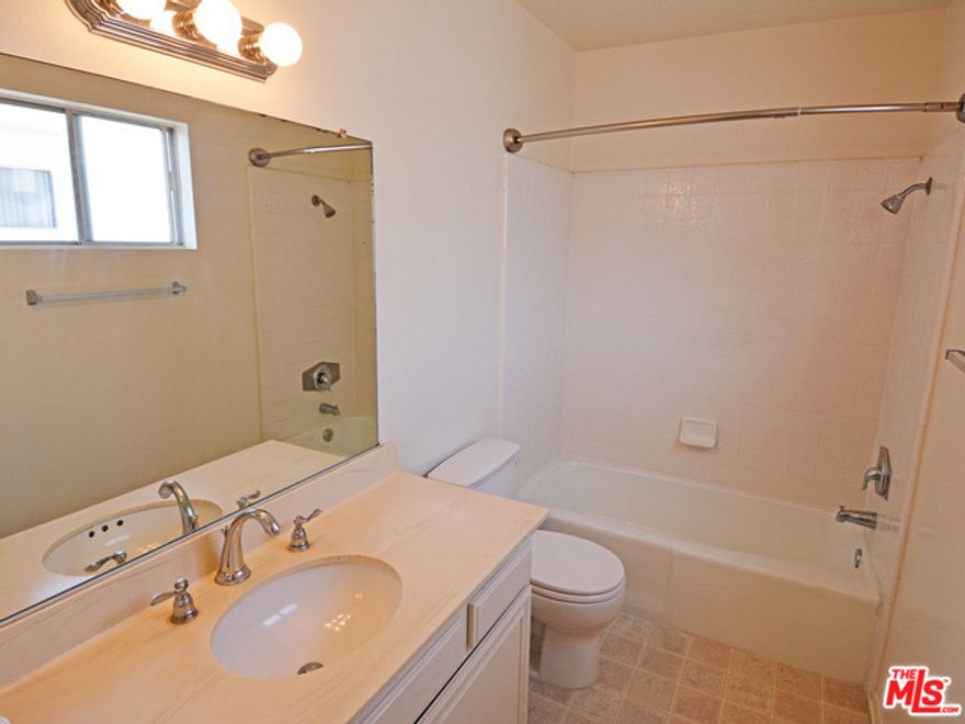 Quiet south facing townhouse with enclosed patio off living room. Treetop and mountain views. Family room/den open to kitchen. Small balcony off master bedroom. Laundry facilities on second floor close to bedrooms. Four guest parking spaces close to unit.