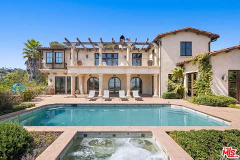 Photo of 1111 Stradella Road, Los Angeles, CA 90077 (MLS # 26849009)