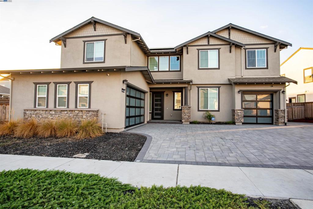Welcome to your dream home in the sought-after River Islands Community, set on large lot with possible side RV access. This stunning 5-bedroom, 4.5 residence offers over $120k custom seller and builder upgrades. The home includes a luxurious GenSuite with a private entrance, bedroom, bathroom, living area, and kitchenette—perfect for guests or extended family. The gourmet kitchen boasts a massive island, walk-in pantry, and quartz countertops. Upstairs, the spacious loft and Master Suite offer ultimate comfort, with a large walk-in closet, soaking tub, and deluxe shower. Upgrades includes 2 custom walls with Fireplace, new pavers driveway, new interior paint, black out window tinting, new carpets, all custom blinds windows covers some remote access, water purifier, right side fence extended, new front door and security screen, custom lighting, owned solar panels and pre-wired EV charging. Large yard for entertaining with ample space to add a ADU, a pool, the possibilities are endless.Offers access to top-rated schools, family-friendly amenities, scenic river-front trails, and much more. NOTE Garage doors in photos Not for sale, doors have been changed to original ones. Seller has Pool permits & plans not in sale but ARE NEGOTIABLE