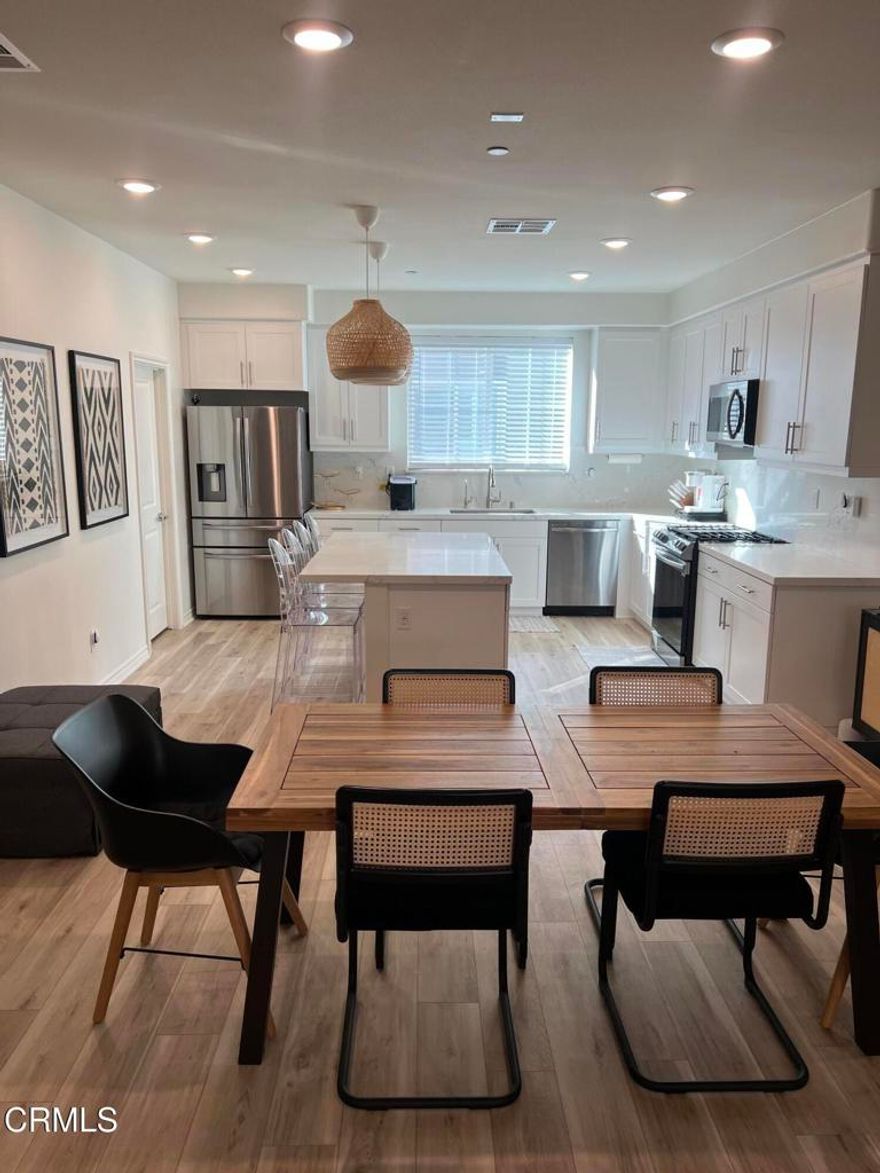 Centrally Located Townhouse in a beautiful, gated community in Carson. The unit has 3 bedrooms and 3.5 baths. All the bedrooms in this spacious townhouse have their own bathroom. The main level has an open and airy floor plan that makes great for entertaining. The kitchen features quartz countertops, stainless steel appliances, and a large walk-in pantry. The main level also features a half bath and balcony. Two bedrooms are located on the 3rd floor as well as the laundry room. There is also another bedroom suite located on the first floor which includes a full bathroom. The townhouse has an alarm system, smart thermostat, ring doorbell and a myQ garage door and camera. There is also a front porch, patio, and an attached two car garage. The Carson Landing community has a pool, spa, BBQ area, dog park and clubhouse.