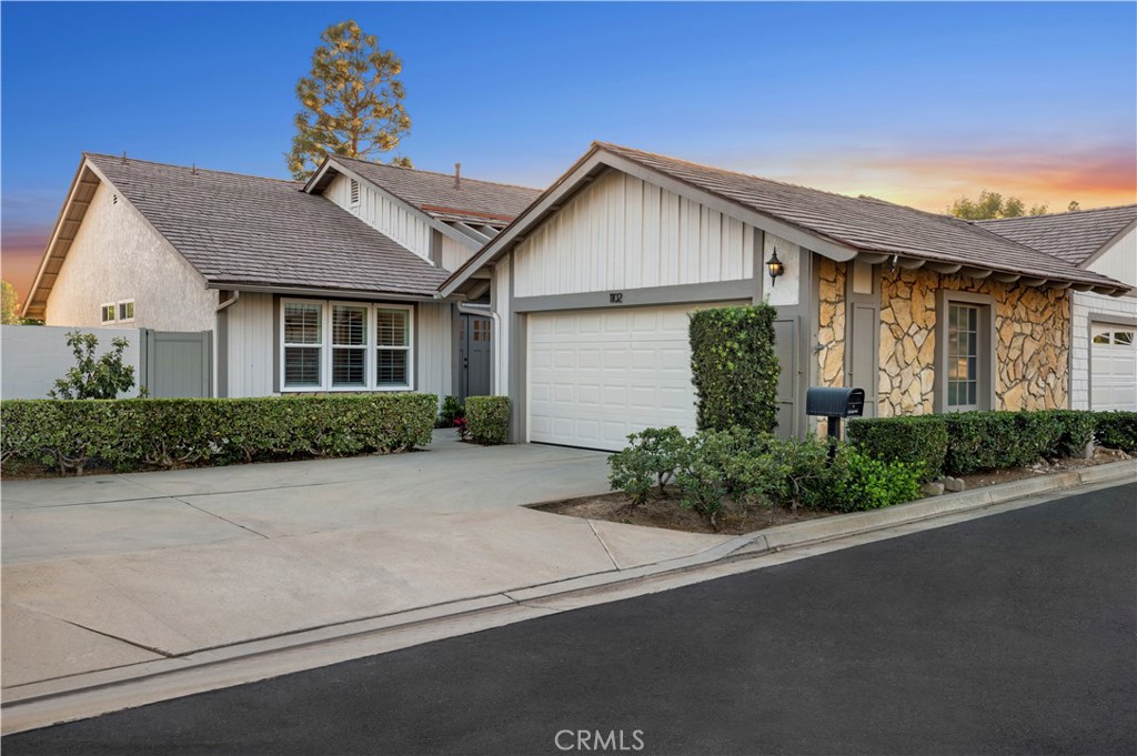 Welcome to 1102 Colonial Way, a beautifully remodeled single level home nestled in the highly sought after community of The Colony in Tustin. Offering 3 bedrooms, 2 bathrooms, and 1,574 sq. ft. of thoughtfully designed living space, this residence combines modern upgrades with timeless comfort. Step inside through the elegant double door entry and discover an open, light filled floor plan where vaulted ceilings and recessed lighting enhance the spacious design. The living room features a dramatic fireplace and sliding glass doors leading to a private patio and grassy yard, perfect for relaxing or entertaining. The chef’s kitchen showcases quartz countertops, Bosch stainless steel appliances, an imported Allia farmhouse sink, a breakfast bar, and charming plank treated ceilings. Flowing seamlessly from room to room, the home is appointed with vinyl flooring in living areas, plush luxury carpet in bedrooms, custom doors and fixtures, upgraded dual pane vinyl windows and tier-on-tier plantation shutters. Retreat to the primary suite with vaulted ceilings, a walk-in closet, and a spa-inspired bath featuring dual sinks, stone tile flooring, quartz counters, white oak cabinetry, and a walk-in shower with dual shower heads. Secondary bedrooms include ceiling fans, and an additional bathroom finished with custom tile and stylish details complete the home. Enjoy resort-style living in The Colony, a community offering a sparkling pool, spa, tennis court, and lush greenbelts. With a prime location close to shopping, dining, and freeways, this home truly has it all.