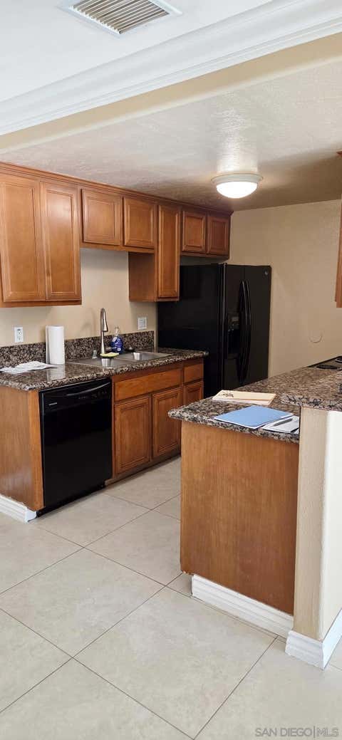 Photo of 1965 Avenida Del Mexico #110, San Diego, CA 92154 (MLS # 260020137SD)