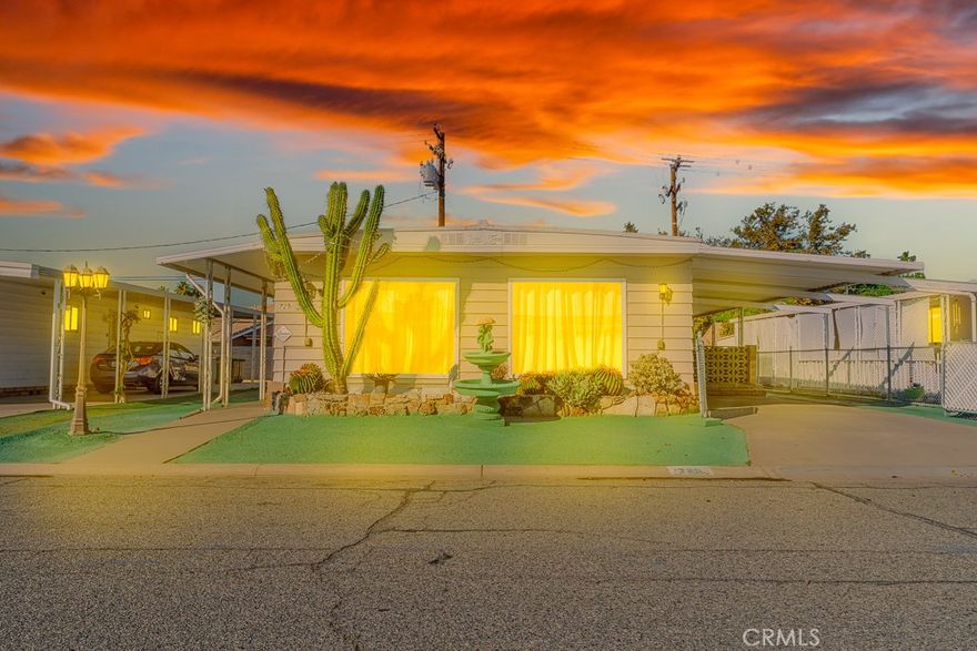 Welcome to this spacious 2-bedroom, 2-bathroom double wide home in the desirable 55+ community of Sierra Dawn Estates. Built in 1970, this well-maintained property features an open floor plan, abundant natural light, and low-maintenance landscaping throughout. Interior highlights include a large living room, formal dining area with built-in China hutch, and a well-appointed kitchen offering garbage disposal, breakfast bar, and pantry. Thoughtful built-in cabinetry throughout the home provides plenty of storage space. The primary suite features ample counter space, a single-sink vanity, and a retro soaking tub. The spacious guest bedroom has direct access to a Jack and Jill bathroom. The indoor laundry room includes washer/dryer hookups and shelving for added convenience. Outside, enjoy a covered patio and carport parking. Located near shopping, dining, and local services, this home offers comfort, convenience, and community living at its best. Sierra Dawn Estates' amenities include 4 clubhouses, 5 pools, Jacuzzi's, Sauna, Exercise Room, Shuffle Board and various other activities...contact management to hear all about it!