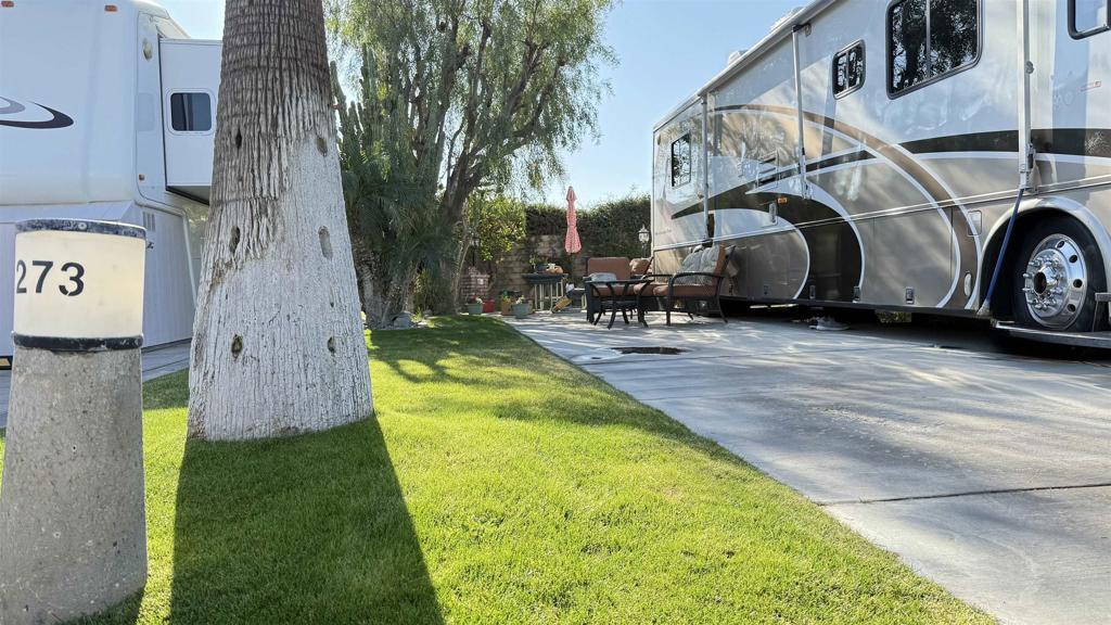Lot 273, In the quiet orchard area of Outdoor Resorts, this community has longstanding owners. You’ll be very welcomed into this group. The lot is original concrete with beautiful patio landscaping and seating. Against the mid resort southeast wall, you’re totally private in your space with all desert behind you. Lot comes with golf cart with all new batteries installed in 2025 and all patio furnishings Outdoor Resort Palm Springs (ORPS) is a Guard Gated 5-Star RV Resort Community offering an active and luxurious lifestyle featuring golf (27 holes), tennis, pickleball, swimming and more! Two clubhouses, fitness center, beauty solan, La Roma Restaurant on campus, dog park and more!