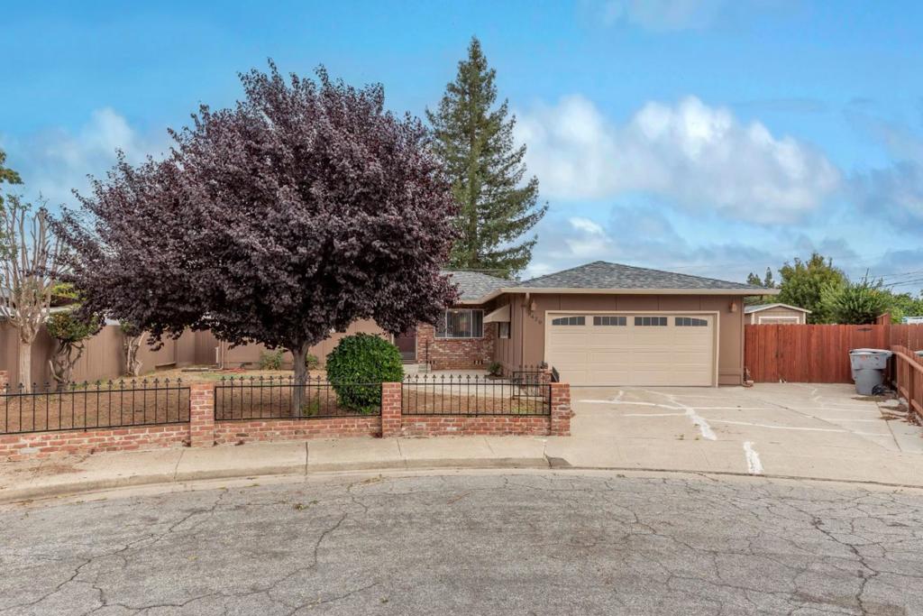 Gilroy home on a cul-de-sac with many upgrades. This single story home has 3 bedrooms, 2 bathrooms is over 1250 square feet, on a large spacious 8600 plus square foot lot. Some updates include, fresh paint inside and out, vinyl flooring (hardwood underneath), updated bathrooms, electric pellet heater in the fireplace, newer water heater, enclosed sun room currently being used as an office (unknown permits), finished epoxied garage floor, extra 16 foot by 8 foot storage in the backyard, RV and/or boat parking behind the gate & newer fencing. Close to parks, downtown, shopping & schools.