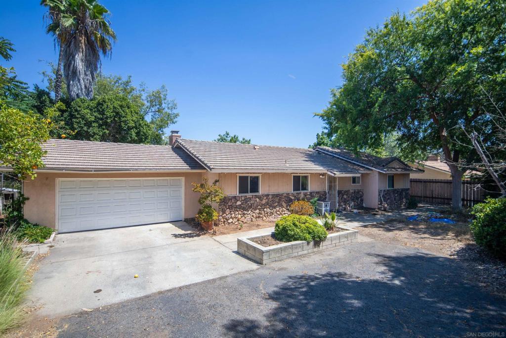 Discover this single story amazing opportunity on more than a half acre lot. The home offers an open floor plan with an enormous lot and view deck. There is potential for an ADU (Accessory Dwelling Unit) on the over 1/2 acre flat lot. This property has amazing potential for a flip, investor or family residence. the landscape, which includes mature fruit trees, is currently overgrown and obscuring the mountain views from the living room, bedrooms and deck.