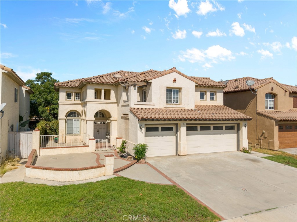 Welcome to this charming 5-bedroom, 3-bathroom home, perfectly positioned in a tranquil, family-friendly neighborhood in Moreno Valley. This residence boasts a spacious open floor plan, seamlessly combining functionality and style. The inviting living room features soaring ceilings, large windows that flood the space with natural light, and a cozy fireplace — creating the perfect atmosphere for both relaxation and entertaining.
The kitchen hoas abundant counter space, and It opens to a bright and airy dining area, ideal for hosting dinners or casual meals with family. A versatile floor plan offers one bedroom and a full bathroom on the main level, ideal for guests or a private home office.
The master suite is a true retreat with an attached bedroom as well that can be used for an office or just a relaxing place also offering a generous walk-in closet and an en-suite bath complete with dual vanities, a soaking tub, and a separate glass-enclosed shower. Two additional well-sized bedrooms share a second full bath, making this home ideal for growing families.
Step outside to a great backyard, offering a serene space to unwind or entertain under the stars wating to put your touches and make it yours The spacious 3-car garage provides ample storage and direct access into the home for added convenience.
Located just minutes from schools, parks, shopping centers, and major freeways, this home offers the perfect blend of comfort, and practicality. Don’t miss the chance to make this Moreno Valley gem your new home!