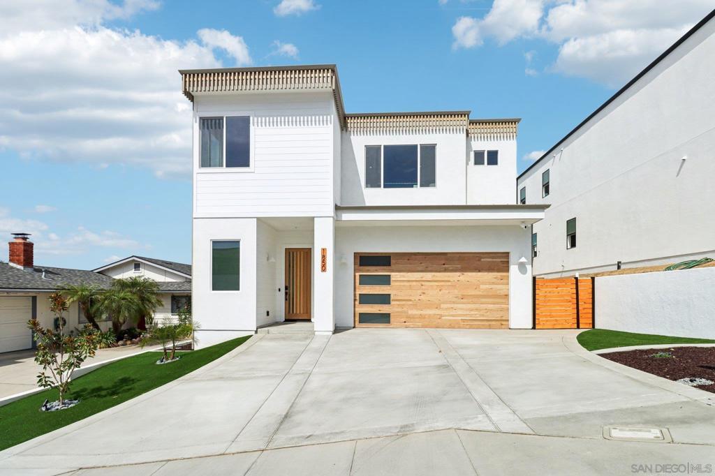 NEW CONSTRUCTION!! Beautiful Bay Park "Beach Chic" Home featuring panoramic views & warm, contemporary styling! Welcome to this stunning 3,008 sq. ft. residence that blends luxury, comfort, and spectacular views. Perched in a premier location, the expansive rooftop deck showcases sweeping vistas stretching from USD, Point Loma, the Bay and Ocean, all the way to Mount Soledad—an entertainer’s dream setting. The primary suite is a true retreat, featuring a spacious walk-in closet, sunset-centric patio, spa-like soaking tub, and an oversized shower. Upstairs, you’ll also find three additional bedrooms, including another with its own en-suite bath, plus a generous laundry room for convenience. At the heart of the home, the chef’s kitchen shines with an 48" Z-line cooktop and double oven with elegant gold accents. Built in double wide refrigerator, a walk-in pantry, crisp white cabinetry, wine fridge, and beautiful marble counters—designed for both style and function. Accordion doors off the living and dining areas seamlessly blend the indoor and outdoor covered patio and private backyard. Thoughtful details throughout include soft close cabinets, wine fridge, epoxy garage floors, 10' high ceilings, and a spacious, open floor plan. This residence offers a rare combination of indoor-outdoor living, upscale amenities, and panoramic San Diego views—making it the perfect place to call home.