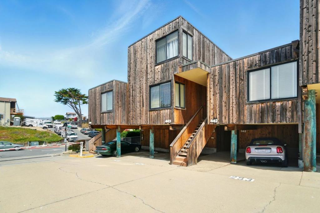 Live just steps from the sand at Del Monte Beach in this bright and breezy 1-bedroom, 1-bath condo. Located at 125 Surf Ave #343, this rare beachside unit offers a perfect blend of coastal charm and everyday convenience. The open-concept layout features hardwood floors, a well-appointed kitchen with bar seating, and large sliding doors that lead to a private balcony ideal for relaxing in the ocean breeze. The spacious bedroom includes ample closet space and a stylish vanity, while natural light flows throughout the home. Set in a secure gated community with covered parking, this home offers direct access to beach boardwalks, trails, and the Monterey Bay shoreline. Whether you're seeking a weekend getaway, full-time residence, or investment opportunity, this is low-maintenance coastal living at its best.