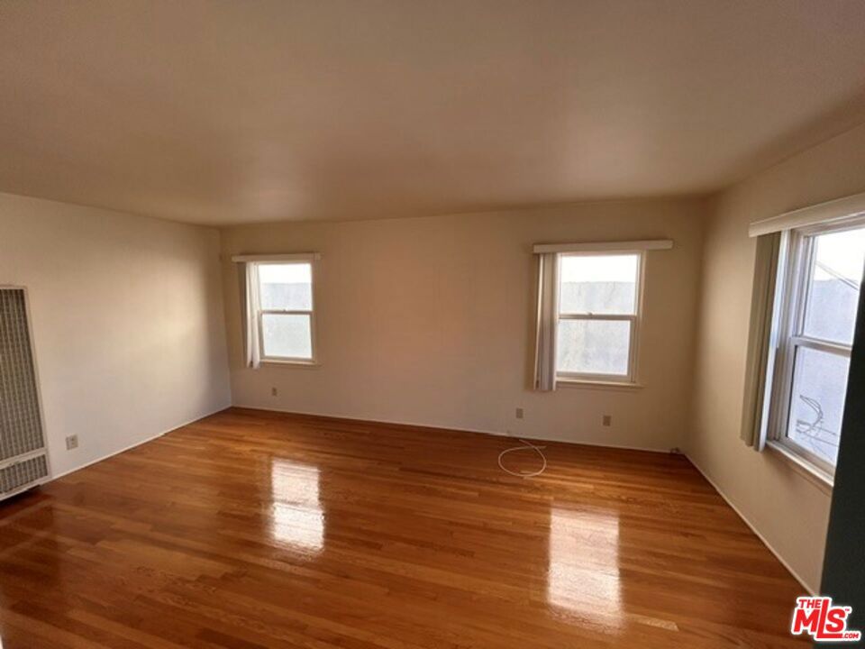 ONE MONTH FREE RENT. Bright & Quiet Charming 1-Bedroom Santa Monica Gem Minutes from the Beach! Bright and airy top-floor unit featuring 1 bedroom, 1 bathroom, and elegant hardwood floors throughout. This quiet back unit offers plenty of natural light and a nice patio, perfect for relaxing or enjoying your morning coffee. The kitchen includes a refrigerator and gas stove, making it easy to cook at home. Just minutes from the beach and the Santa Monica Mall, with washer and dryer conveniently located on the first floor. Call for parking details. Enjoy peaceful coastal living in one of Santa Monica's most sought-after neighborhoods!