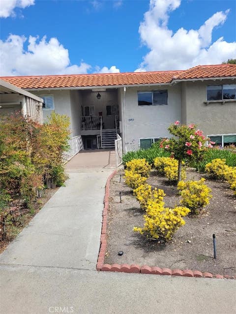 Photo of 2293 Via Puerta, Laguna Woods, CA 92637 (MLS # OC26147417)