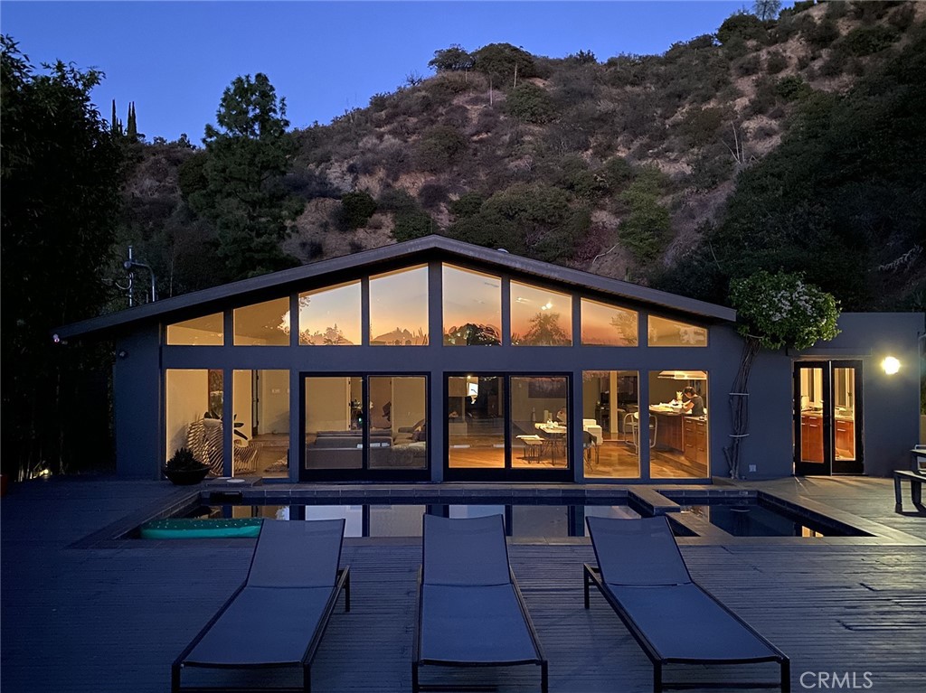 Short-term rental with hotel-like amenities! Home is fully furnished. Extremely private single story home surrounded by nature. Beautiful mid-century style modern home originally designed by Neutra apprentice Donald P. Polsky. Panoramic view of ocean and canyon view. Large backyard with swimming pool and spa. Bright open floor plan with high ceiling through-out the home. 3 large bedroom suite each with it’s own private bathroom lots of closet space. Additional office room and guest bathroom. Gourmet kitchen with huge island, built-in Sub Zero fridge, upgraded appliances, and mini-wine fridge. 2 car garage with Telsa EV Charger. Separate room on side of home can be used as storage or more office space. Landlord pays for water, electricity, gas, trash, gardener, pool man. Available for immediate move-in.