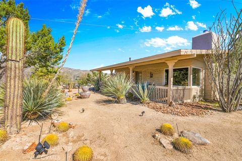 Photo of 49399 Conejo Rd, Morongo Valley, CA 92256 (MLS # JT26038625)