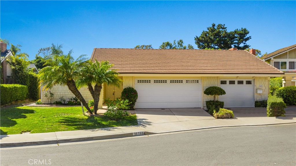 Prime Location in Irvine’s Top School District! Walk to Turtle Rock Elementary, University High School, and even UCI—all just minutes away. Step outside to a charming neighborhood park, and you're only 5 minutes from nearby supermarkets and shopping plazas. This gorgeous 3-bedroom, 2-bathroom home is filled with natural light in every corner. The spacious floor plan is bright and airy, featuring elegant wood and marble flooring, soaring ceilings, high-end designer windows, and a beautifully maintained garden with a resort-style patio. The inviting living room includes a cozy fireplace and flows seamlessly into the formal dining room. The kitchen showcases classic black granite countertops and opens to the family room with lovely garden views—perfect for entertaining. Unwind in the luxurious master suite, complemented by two spacious secondary bedrooms and an exquisitely upgraded second bathroom. Each bedroom is fitted with stylish ceiling fans for added comfort. Just steps from the park, top-rated schools, and boutique shopping. This model-perfect home is ready to welcome you!