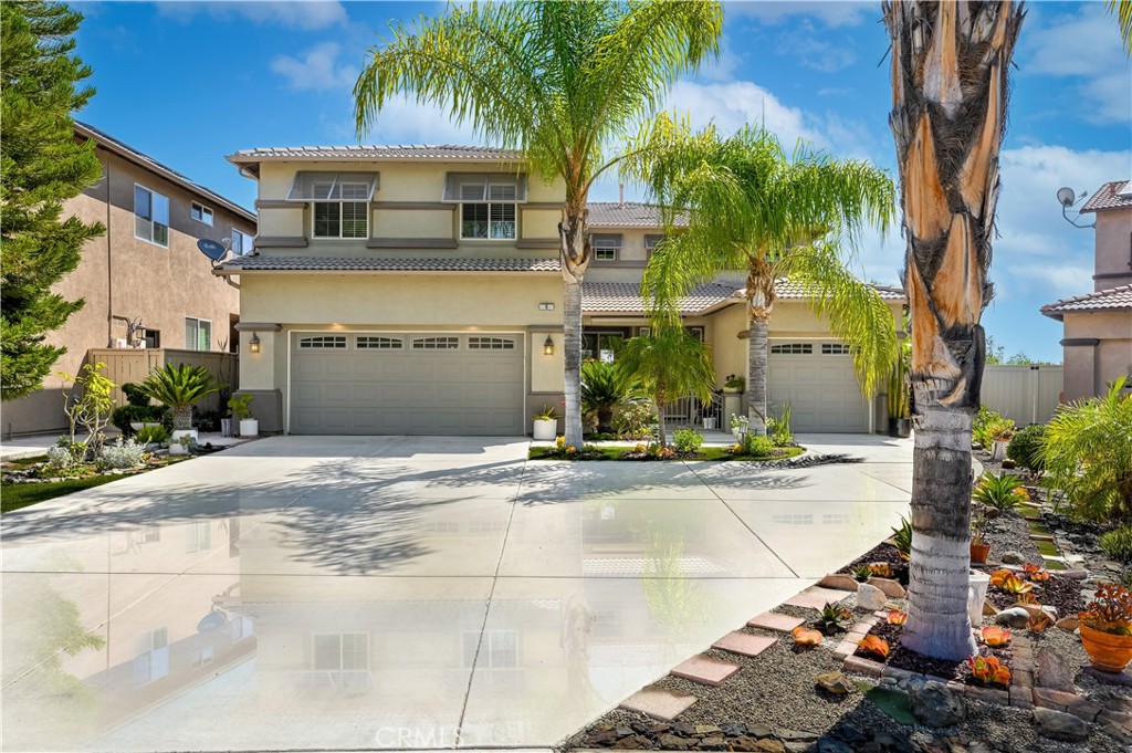 Gorgeous highly upgraded 5 bedroom 3 bathroom home with a BIG bonus room in beautiful Tuscany Hills on a huge view lot! This Home has a generous kitchen and family room, formal living and dining room with high dramatic ceilings, Beautiful dark wood laminate floors in the kitchen, family room, stairs and all throughout the upstairs. In the kitchen and bar area there are gorgeous granite countertops, new custom cabinetry, Stainless Steele appliances including double ovens, and built in range. Every part of this house has been meticulously taken care of, and turn key is an understatement. There is a Beautiful view of Canyon Lake and the surrounding hills from the upstairs Master Suite and balcony with a separate jacuzzi tub and shower. The front and back yards are beautifully landscaped with gorgeous plants, flowers and trees including a Fig Tree that will keep your baskets full of fruit! Pool Size Lot! The HOA has great amenities including a park and BBQ area, playground, kiddie pool, jacuzzi, huge pool, gym, basketball, tennis pickle ball and volleyball courts that are gated with security, and a club house. The neighborhood has Tuscany Hills Elementry which is a Blue Ribbon School, and a big park with a baseball field and playground!