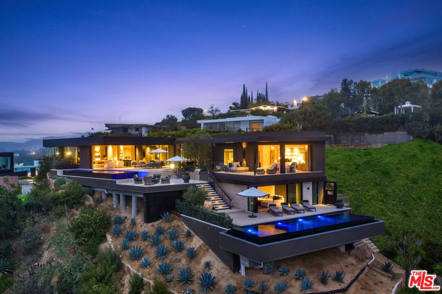 1616 Blue Jay Way is Boswell Constructions latest masterpiece in the prestigious Bird Streets. After 5 years in the making, this one of a kind contemporary estate is the epitome of design, luxury, class and technology. The meticulously built 5,000 sqft, 4 bedroom, 4.5 bathroom trophy boasts two infinity edge pools with seamless and expansive indoor/outdoor entertaining overlooking the explosive views from the LA basin to DTLA to the ocean. The sophisticated master suite sits on top of the world with Jetliner views. This unrivaled property is just minutes from the famed Sunset Strip. Bring your most discerned buyer.