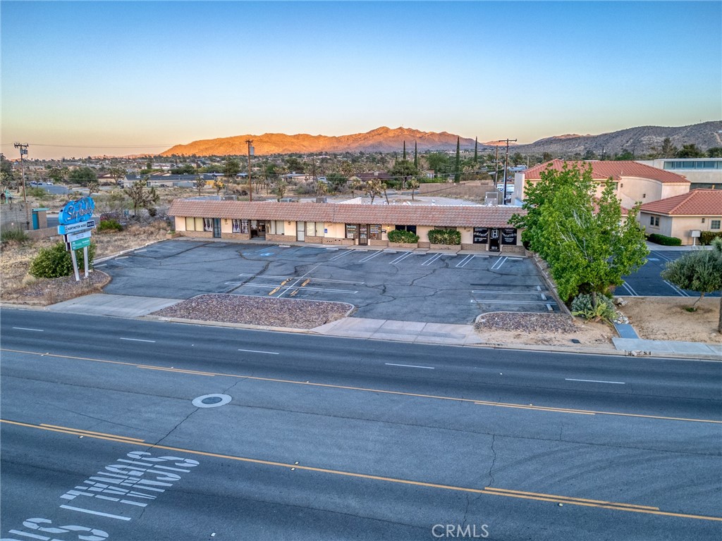 Here’s your chance to own a fantastic 3,360 sq ft commercial building in what many would agree is one of the best locations in Yucca Valley. Just off the highway on a well-traveled road, this spot offers unbeatable visibility and easy access, with both front and back parking for you and your clients.
The building is currently split into two units—both are rented, but one side may be opening up soon, giving you a unique opportunity to run your own business while collecting rental income from the other. It’s a win-win!
You’ll love how close this property is to everything—banks, the post office, and other key amenities are just a short walk away. It's the kind of location that makes things easy, whether you’re running errands or welcoming customers.
And here’s the exciting part: the owner may carry with $200,000 down (on acceptable terms), making this an incredibly accessible investment opportunity.
If you’ve ever dreamed of having your own space to grow a business—or just wanted a solid property in a great location—this could be your moment. Make the time to come see it for yourself… you’ll be glad you did!