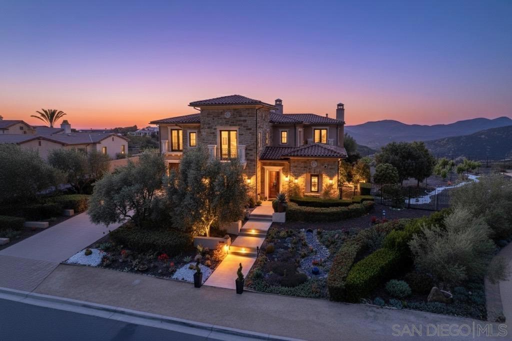 La Dolce Vita...a farm to table property in Cielo! Perched on a coveted view lot in the gated community of Cielo, this custom built home is a perfect blend of quality craftsmanship and relaxed California living. With 180 degree panoramic views stretching from the Pacific Ocean to the snow-dusted mountains, the setting is both private and breathtaking. Designed for those who appreciate quality and tranquility, the home sits on an expansive lot offering an unique opportunity to build a detached Casita or ADU (currently a producing vineyard). Sellers will convey recent HOA approved plans for a stunning pool, spa and entertainment area, which can be implemented immediately for construction. Inside, the residence unfolds with a warm, light-filled, open-concept floor plan allowing for seamless living from one space to the next, blending a warm craftsman contemporary style. At the heart of the home is a chef’s dream kitchen—appointed with multiple premium Viking appliances, back kitchen and pantry, leathered Taj Mahal quartzite dual islands which can accommodate over 20 guests for dining and a temperature controlled wine cellar. The primary suite located on the second floor, takes in sweeping coastal and mountain views, additional (4) guest rooms are all en-suite and anchored by a upstairs game or media room for the entire family to enjoy. La Dolce Vita...a farm to table property in Cielo! Perched on a coveted view lot in the gated community of Cielo, this custom home is a perfect blend of quality craftsmanship and relaxed California living. With 180 degree panoramic views stretching from the Pacific Ocean to the snow-dusted mountains, the setting is both private and breathtaking. Designed for those who appreciate quality and tranquility, the home sits on an expansive lot offering an unique opportunity to build a detached Casita or ADU (currently a producing vineyard). Sellers will convey recent HOA approved plans for a stunning pool & spa, shovel ready. Inside, the residence unfolds with a warm, light-filled, open-concept floor plan allowing for seamless living from one space to the next, blending a warm craftsman contemporary style. At the heart of the home is a chef’s dream kitchen—appointed with multiple premium Viking appliances, back kitchen and pantry, leathered Taj Mahal quartzite dual islands which can accommodate over 20 guests for dining and a temperature controlled wine cellar. The primary suite located on the second floor, takes in sweeping coastal and mountain views, additional (4) guest rooms are all en-suite and anchored by a upstairs game or media room for the entire family to enjoy. Step outside and take in the golden hour from one of the many outdoor living areas. Whether hosting guests for al fresco dinners or enjoying quiet moments beneath the stars, this property was made for indoor-outdoor living. Featuring a trellised dining area with raised vegetable garden boxes, outdoor loggia with fireplace and a private vineyard to produce your own boutique Pinot Noir. Cielo residents enjoy access to resort-style amenities including a fully equipped fitness center, clubhouses, tennis and pickleball courts, playgrounds, and sports courts. Community events throughout the year create a lively, connected lifestyle. This is an accredited Fire Safety and Shelter in Place community with its own Fire Department and emergency equipment on property, combining safety and luxury at all times.