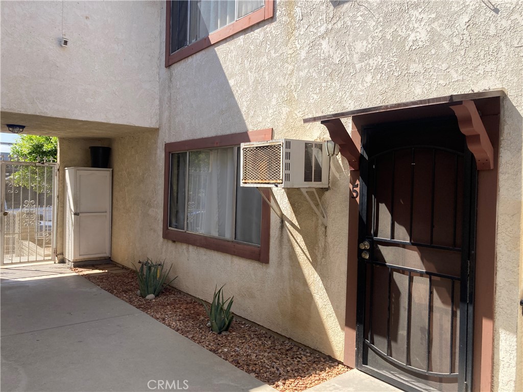 * 2 Bedroom*1 Full Bathroom Apartment*Ground Level Access*Wall A/C Unit in Living Room*Wall Furnace*On Site Parking Lot*Security Cameras*Close to Stores & Shops*