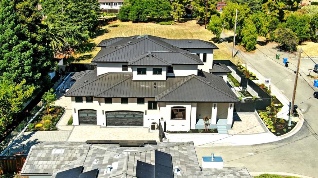 Brand-New Luxury Home + ADU in Fremont Mission District! Stunning 6,265 sq ft estate featuring a 5,404 sq ft main home with 5 beds + office, 4.5 baths, and dual laundry rooms (upstairs & downstairs). Attached 861 sq ft ADU includes 2 beds, 1 bath ideal for guests or rental income. Southeast-facing on a beautifully landscaped lot in Fremont top-rated Mission school district. Chefs kitchen with Thermador built-ins, 2 dishwashers, wine fridge, gas stoves. Heated master bath floor, whole-house audio, keyless entry, metal roof, aluminum fencing, and automatic gate. 3-car garage + 3-car carport. Easy freeway and shopping access.
