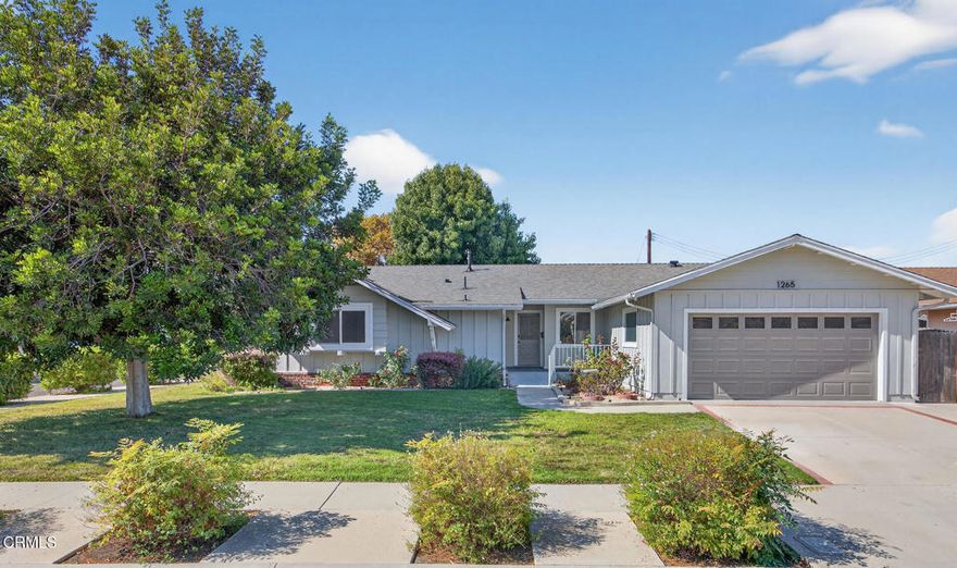 Resting on a desirable corner lot in the heart of Camarillo, this beautifully renovated single-story ranch-style home presents a spacious layout with 4 bedrooms, 2 baths, and nearly 1900sf of living space. Beyond its charming architecture, and large front yard graced by a beautiful mature tree, the home invites you in with warm wide-plank flooring, crisp interior paint, all new modern fixtures, and a natural flow that connects the kitchen, dining and living spaces. The newly redesigned kitchen serves as the centerpiece -- featuring calacatta quartz counters, full-wall zelige tile backsplash, all new stainless appliances, modern fixtures & hardware, custom cabinetry, and a spacious island with counter seating that welcomes conversation and gathering. Two comfortable living spaces embrace the kitchen, creating ample room to entertain, or enjoy quality family time. The expansive living room centers around the warming brick fireplace and large sliders that lead out to the covered patio and expansive backyard.  Down the hall is the new beautifully designed guest bath and all four bedrooms, including the primary suite- a quiet retreat with a designer-appointed ensuite bath featuring a new walk-in shower, new flooring, all new fixtures, and new dual vanity.  Outside, the large corner lot provides generous space for play, gardening, or relaxing under the Camarillo sunshine -- the perfect backdrop for weekend barbecues or evenings spent with family and friends. From morning coffee on the patio to evening dinners under the stars, this home captures the essence of relaxed, modern California living. Conveniently located just minutes to award winning schools, a multitude of family friendly parks, shopping, restaurants, and freeway access. Don't miss this incredible turn-key opportunity to own in one of Camarillo's best neighborhoods!