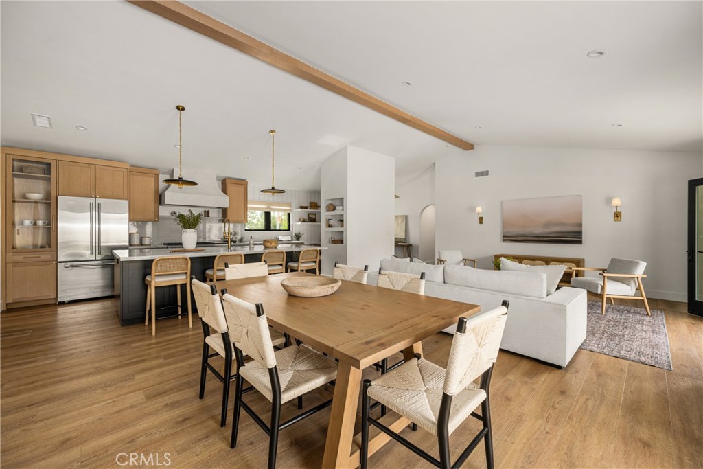Welcome to this fully custom North Tustin property, nestled in one of the area’s most sought-after neighborhoods.From the moment you arrive, the curb appeal stands out with brand-new landscaping, uplighting in both the front and backyard, shiplap siding, and a charming custom Dutch door that sets the tone for what’s inside. Step inside to soaring vaulted ceilings and flawless stage 5 drywall finishes that showcase the home’s craftsmanship. The open-concept design highlights new flooring, custom cabinetry, and quartzite countertops in a stunning chef’s kitchen, complete with a Venetian smooth plaster hood vent over a Monogram range. Anderson black windows and Milgard black French doors bring in natural light while creating a seamless indoor-outdoor flow. Every detail has been thoughtfully curated, including custom bathrooms designed from top to bottom, upgraded lighting fixtures, a dedicated indoor laundry room with built-in cabinetry, and completely updated electrical and plumbing systems for peace of mind. Outdoors, the private backyard is an entertainer’s dream with brand-new fencing, professional landscaping, and a brand-new spa to enjoy year-round. The property also features massive RV or boat access, offering both luxury and practicality. This rare opportunity to own a fully custom North Tustin home blends modern elegance, high-end finishes, and everyday functionality—truly a turnkey property in one of Orange County’s most desirable communities. Located around Award Winning Tustin Schools.