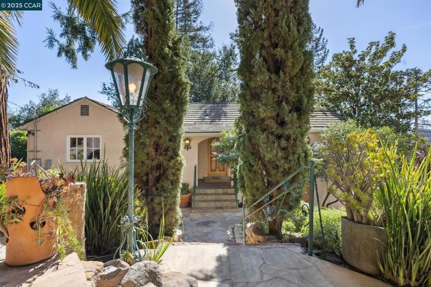 OH Saturday and Sunday, 1 to 4 PM - $350,000 price reduction from original $1,795,000 listing price! Nestled in Orinda’s Country Club neighborhood on a peaceful .3-ac lot, this enchanting 4BR/3.5BA home is a vibrant sanctuary for a family to thrive. Enjoy 2400+ sf of flexible indoor space—the central home, an ADU, and a modular office within magical gardens.  The Central Home features HW floors and Euro double pane doors/windows, flooding the main floor with natural light. The master bedroom boasts ample closet space and ensuite bath with two add bedrooms, another full bath, and cozy family room downstairs. Prepare meals in the chef's kitchen, gather in the sunny dining room, or dine al fresco on the spacious wraparound deck. And unwind in the living room or on the connected patio with views of the SW Oakland Hills.    An ADU with a balcony provides flexible space—a guest suite for family/friends, a bedroom/playroom for kids, a home office, or rental unit. And a modular office with electricity offers a dedicated workspace for parents just steps from the main house.  Relax amongst exotic gardens with palm trees and redwoods, flagstone pathways that lead to tranquil seating areas, and a lawn for play structures or vegetable beds.