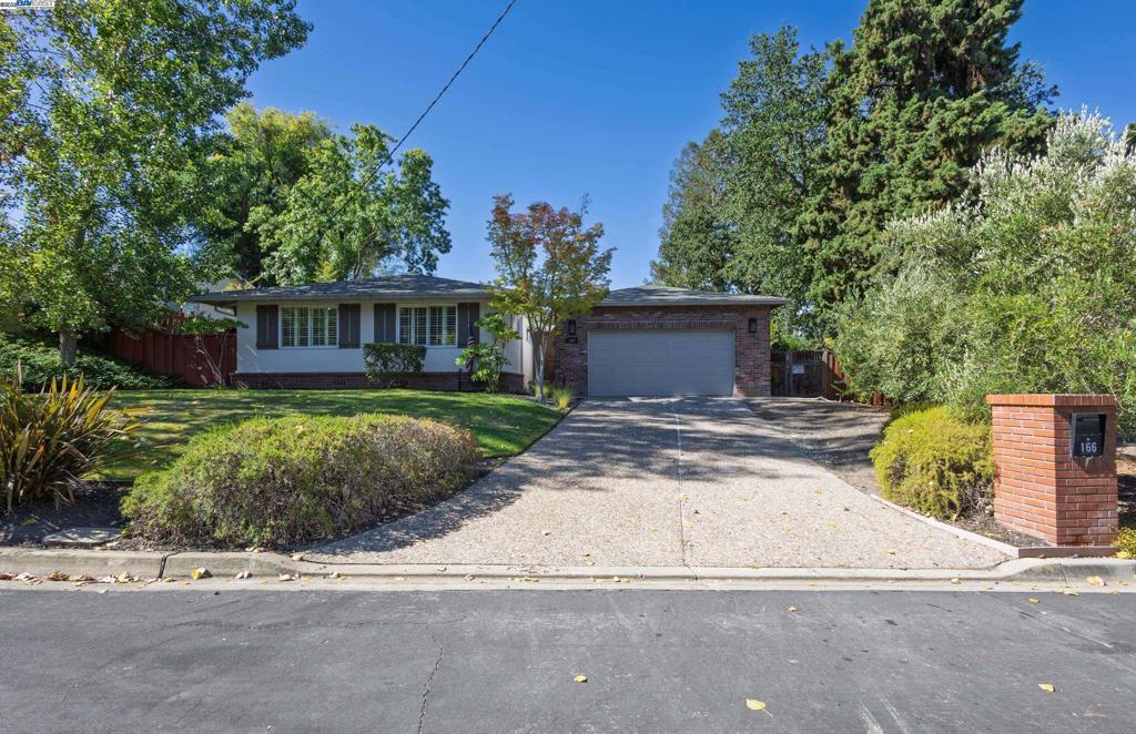 As you walk into this beautifully maintained 5-bedroom, 2.5-bath single-story home nestled on a tree-lined street in the sought-after Las Lomitas neighborhood, you’ll notice the pride of ownership and thoughtful upgrades throughout the property. The spacious layout features custom built-in cabinetry in both the living and dining rooms, rich wood flooring, and elegant finishes. Enjoy the California lifestyle with your own private pool and spa ideal for entertaining or relaxing at home. The home sits on an expansive lot with potential for additional seating, a picnic area, or even future expansion in the area behind wooden fence. The dedicated laundry area offers plenty of space to fold and hang clothes with ease. Just a hop, skip, and a jump from the 680 freeway and minutes to vibrant downtown Danville, this home is also within close proximity to Vista Grande Elementary School, Los Cerros Middle School and Monte Vista High School, a National Blue Ribbon School. This tight-knit neighborhood is known for its multi-generational appeal, charming character and friendly vibe.