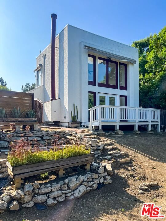 844 1/2 Maltman Ave is a Silver Lake one-of-a-kind, two-story stand-alone architectural gem with stunning natural light and a modern, open layout.Step into a sun-drenched living space with floor-to-ceiling windows, skylights, and soaring ceilings. The open-concept design flows into a spacious modern kitchen featuring all the appliances you need, including a refrigerator, dishwasher, microwave, and oven/stove. Upstairs, the balcony loft bedroom overlooks the main living area and custom closet. Enjoy your own outdoor patio/deck, a fenced-in expansive backyard landscaped with succulents and stone walkways ideal for lounging, entertaining, or letting pets roam freely. With parking, in-unit washer/dryer, and a fireplace, every detail is designed for comfort and style. Highlights:Pet-Friendly, Breathtaking Natural Light Skylights & Loft, Standalone Structure Patio/Deck + Expansive Yard, Parking Included, Custom Storage Closet, Prime Silver Lake Location Moments from Sunset Blvd's best cafes, boutiques, and nightlife, this rare find is perfect for creatives, pet lovers, and anyone seeking a peaceful yet vibrant home base in LA.