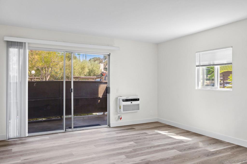 Live in the heart of Mission Valley in this beautifully upgraded studio! Step inside to a bright, open living and sleeping area, featuring fresh LVP flooring, a large sliding glass door to your private patio, and an additional window that floods the space with natural light. The spacious patio, enclosed by tall privacy fencing, creates a serene retreat perfect for morning coffee or evening unwinding. Inside, the dining area flows seamlessly into the fully remodeled kitchen, complete with crisp white cabinetry, sleek Quartz countertops, and brand-new stainless steel appliances. The bathroom mirrors the kitchen’s modern design with matching cabinetry and Quartz countertops, a shower/tub combo, and a generous closet for extra storage. Enjoy resort-style living with community amenities including a sparkling pool and spa, BBQ area, clubhouse, and convenient on-site laundry. With one assigned parking space and unbeatable access to shopping, dining, and the scenic San Diego River Trail, this Mission Valley gem offers both comfort and convenience.