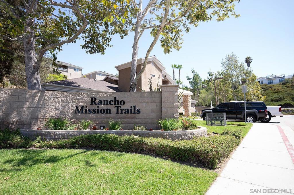 Welcome to one of the most desirable units in the Rancho Mission Trails community! This second level peaceful and private condo is perfectly situated at the rear of the complex, surrounded by lush greenery and sharing only one wall for added tranquility. Inside, you will find a spacious open floor plan with updated finishes, including granite countertops, gas appliances, and a cozy fireplace for relaxing evenings. Enjoy your morning coffee or evening wind-down on the private balcony. The layout is thoughtfully designed with bedrooms on opposite sides, ideal for privacy or shared living. Additional features include: new carpet, new gas stove, new microwave, new paint throughout, water heater installed in 2022, refrigerator installed in 2023, in-unit washer & dryer, walk-in closets, energy-efficient solar power with low electric bills, light fixtures have been updated to LEDs, many with with dimmer switches, and two non-tandem assigned parking spaces in the garage. Community amenities include beautifully maintained grounds, weight room, a sparkling pool & spa, clubhouse, and picnic areas – perfect for entertaining or unwinding. Just minutes from Mission Valley, shopping, dining, and hiking trails. Don’t miss out on this rare opportunity to own a serene retreat in a prime San Diego location!