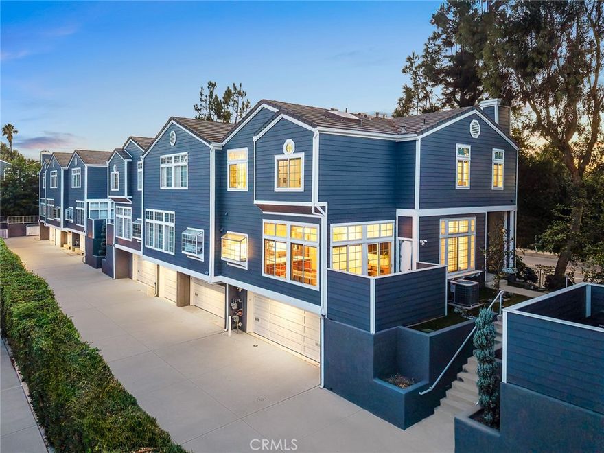 No Expense Spared in This Fully Renovated 3-Bedroom Townhome in Prime Location



Beautifully upgraded 3-bed, 3-bath townhouse offering 2,003 sq ft of stylish living (plus approx. 300 sq ft lower level not included in recorded sq ft). Built in 1990 and fully renovated with luxury finishes, this rare end-unit shares only one common wall. Enter to soaring ceilings, a warm living room with fireplace, and an airy open feel. The main level is designed for entertaining with a wet bar, wine fridge, accent wall, designer powder room, and seamless flow between living, dining, family, and kitchen spaces.



The gourmet kitchen features porcelain countertops, bar seating, custom cabinetry, hidden commercial-grade hood, and high-end stainless appliances, opening to a bright family room with oversized windows. Upstairs, the primary suite boasts vaulted ceilings, fireplace, his-and-hers walk-in closets, skylights, and a spa-inspired bath with heated floors.



The lower level offers a private office/gym, laundry room with sink, and garage with Tesla charger and wall-to-wall cabinetry. Upgrades include custom window shades and all new windows.



Prime location near Topanga Mall, The Village, Trader Joe’s, and top dining options.