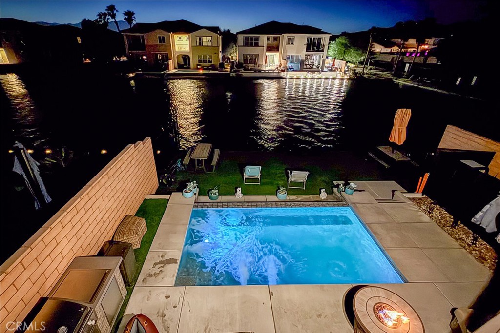Beautiful Lakefront Home in Gated Community – Fully Furnished & Airbnb Ready. Own Short Term Rental Gem on the Lake in Terra Lago. Great rental investment and located 10 mins away to Coachella Valley and stagecoach Festivals, Indian Wells Tennis Garden.
This stunning 4-bedroom, 3.5-bathroom home is located in a desirable gated community and offers the perfect combination of elegance and investment potential. Featuring a spacious loft, elegant furnishings, and high-quality appliances, this property is fully furnished and turnkey—ready for use as a primary residence, vacation home, or Airbnb rental. HOA includes guard and gated community, pool and spa cable and internet.
The backyard is an entertainer’s dream with a sparkling pool, spa, and direct lake access, creating a serene retreat with breathtaking views. Designed for comfort and style, this home offers open living spaces, abundant natural light, and modern finishes throughout.
Don’t miss this opportunity to own a beautiful lakefront property with strong income potential.