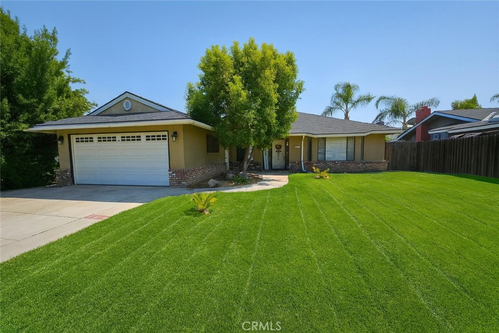 Welcome to your future home in one of Fresno's most desirable areas! This beautifully laid-out residence offers 3 spacious bedrooms, 2 full bathrooms, and nearly 1,600 sq. ft. of comfortable living space designed with both function and lifestyle in mind. From the moment you arrive, you'll notice the large front yard that creates an inviting first impression and provides plenty of outdoor space to enjoy. Inside, the home features not one, but two oversized living rooms, giving you the flexibility to create a cozy gathering area, an entertainment space, or even a home office. The bedrooms are generously sized, offering comfort and privacy for every member of the household. Step outside to a big backyard that's perfect for summer barbecues, gardening, or simply relaxing in your own private outdoor retreat. The property is set in a well-established neighborhood known for its pride of ownership, tree-lined streets, and close proximity to everything Fresno has to offer. Just minutes away, you'll find shopping centers, schools, restaurants, parks, and all the amenities you could ask for—making life not only convenient, but enjoyable. This home truly has it all: space, comfort, location, and endless potential. Whether you're looking for room to spread out or simply seeking a home in a highly sought-after area, this property is one you won't want to miss. Don't wait—homes like this in this neighborhood rarely last long!