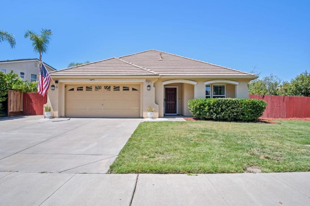 Beautiful home in one of Manteca's most sought-after neighborhoods Dutra Farms. This well-maintained single-story home offers 3 bedrooms, 2 bathrooms, and an open floor plan on a large 7,571 sq ft corner lot just steps from the scenic Bella Vista Park. Inside, you'll find brand new luxury vinyl flooring, granite kitchen countertops, and refinished cabinets. The kitchen also features a brand new dishwasher and a sleek granite composite sink with a pull-down faucet. Bathrooms have been updated with a new glass shower door, modern faucets, and water-efficient toilets. Additional upgrades include recessed lighting and stylish new light fixtures throughout. Smart home features include a Google Nest thermostat, Ring video doorbell, and a front door smart lock with fingerprint and keypad access. Theres also a 240V / 32A outlet for EV charging in the garage. Step outside to a spacious, low-maintenance backyard featuring over $20,000 in custom concrete work, gated RV parking, and several fruit trees. Conveniently located with quick access to the 120 freeway and minutes from Costco, Great Wolf Lodge, and the Stadium Shopping Center, with even more shops coming soon to the Crossing at Atherton and Airport Wayoffering the perfect blend of comfort and convenience.