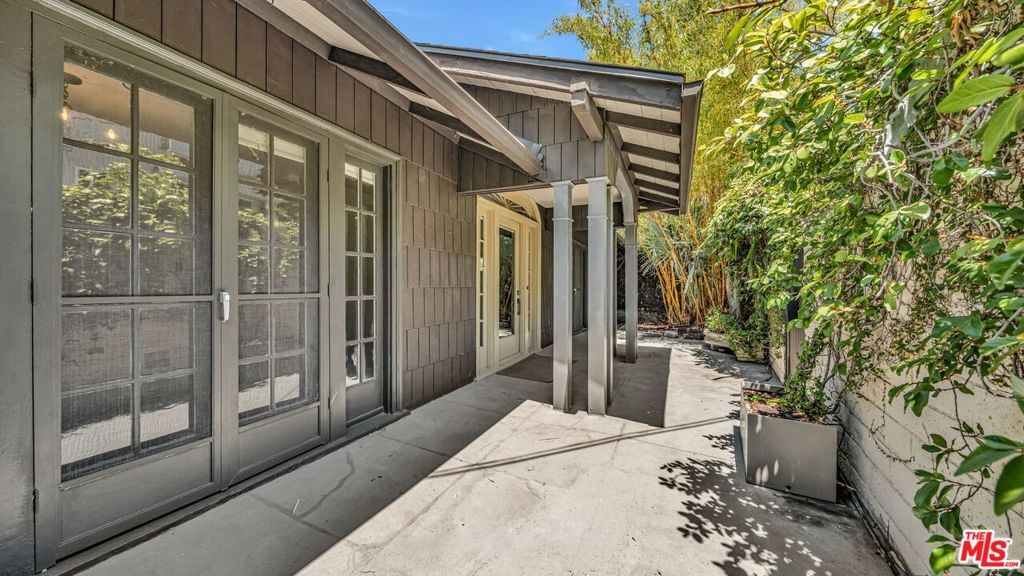 Beautifully Restored Craftsman two-story home right next to a private park. This 3bed 2bath house is 1800sq feet with a private patio, backyard & a private deck shaded by mature plants and trees. The top floor features the large living room and three bedrooms or two bedrooms and an large office. The lower level features the updated kitchen, formal dining room, laundry room and a private deck with additional outdoor space. Other features include hardwood floors, original details throughout and central AC. The multitude of windows in this home offer plenty of natural light and an additional golden glow during the sunset hours. Enjoy this classic, quiet and serene property steps away from the Magic Castle, Yamashiro, Grauman's Chinese Theater and the Hollywood Bowl! PET FRIENDLY