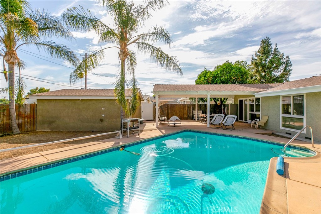Welcome to this charming Granada Hills pool home with endless potential! Featuring 3 bedrooms and 2 bathrooms, 1519 square feet, this property offers a spacious layout and a backyard designed for relaxation and entertaining. Enjoy sunny days by the sparkling pool and take advantage of the detached garage, ideal for an ADU conversion or creative space. Conveniently located near schools, shopping, dining, and freeway access, this home is perfect for buyers looking to personalize and create their dream space in one of Granada Hills' most desirable neighborhoods.