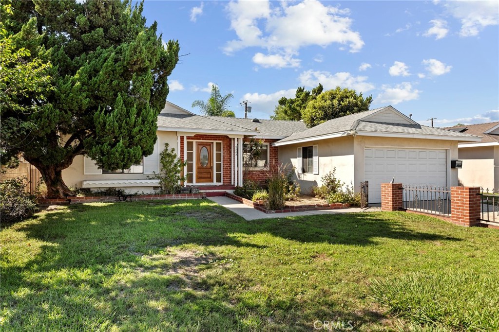 Discover charming single-story living in this inviting 3-bedroom, 2-bathroom home, perfectly situated on a generous 7,688 sqft lot. Built in 1953, this 1,153 sqft gem boasts a fresh interior with new paint throughout, offering a bright and airy atmosphere. The updated kitchen is ready for your culinary adventures, while the solar panels provide energy efficiency and savings. Enjoy the convenience of an attached 2-car garage with direct access. With a good-sized front and back yard bathed in ample sunlight, there's plenty of space for outdoor enjoyment and gardening. This home combines classic appeal with modern comforts, awaiting its next chapter.