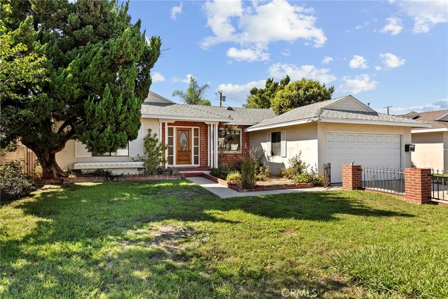 Discover charming single-story living in this inviting 3-bedroom, 2-bathroom home, perfectly situated on a generous 7,688 sqft lot. Built in 1953, this 1,153 sqft gem boasts a fresh interior with new paint throughout, offering a bright and airy atmosphere. The updated kitchen is ready for your culinary adventures, while the solar panels provide energy efficiency and savings. Enjoy the convenience of an attached 2-car garage with direct access. With a good-sized front and back yard bathed in ample sunlight, there's plenty of space for outdoor enjoyment and gardening. This home combines classic appeal with modern comforts, awaiting its next chapter.