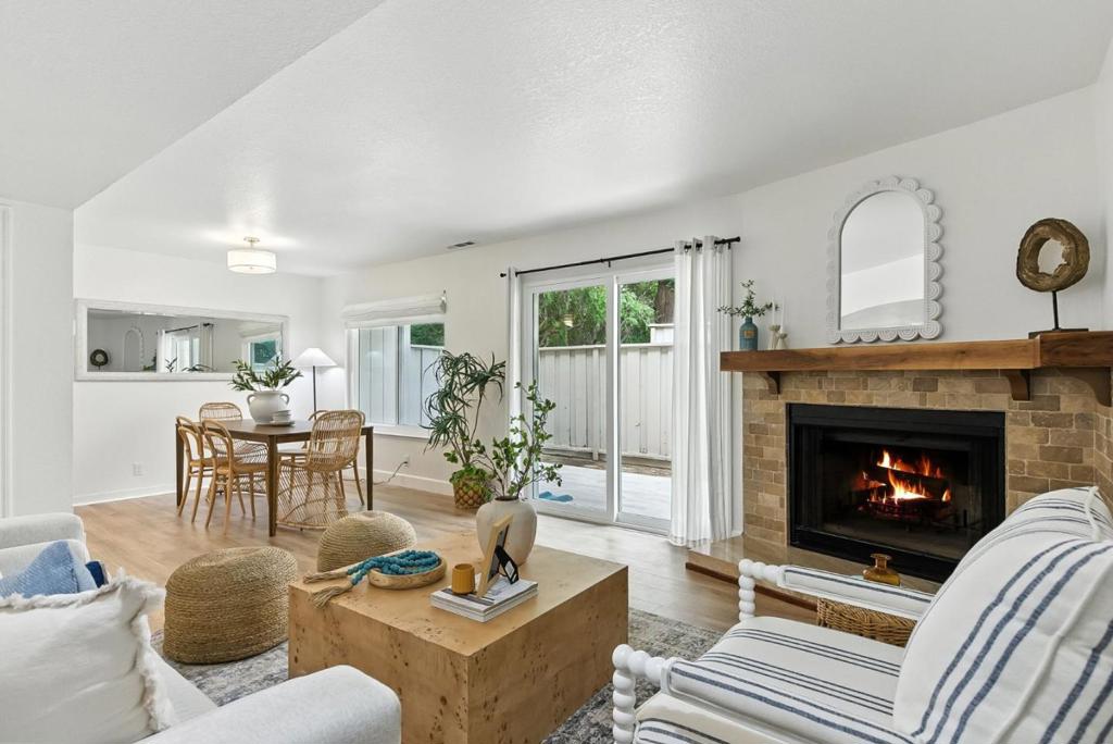 Welcome to this newly remodeled condo located in the heart of Santa Cruz County! This charming 2-bedroom 2.5-bath corner-unit condo offers the perfect blend of modern comfort, style, and location just minutes from the beach, Capitola Village and the vibrant energy of downtown Santa Cruz Recently renovated from top to bottom two years ago, this bright and airy home features nearly 1,250 sq. ft. of living space with Pergo flooring, custom porcelain-tiled shower walls in the primary, and custom tile floors throughout the bathrooms. The spacious primary suite is a private retreat complete with a balcony, jacuzzi tub, and spa-inspired finishes, oversize walk-in closet. The kitchen shines with Whirlpool stainless steel appliances, quartz countertops, recessed lighting, and a open functional layout perfect for everyday living. Enjoy the sun on your entry patio large enough for outdoor furniture, set on a end-corner lot that offers extra natural light and privacy. Perfectly situated between Cabrillo College and UC Santa Cruz, and just minutes to Dominican and Sutter hospitals, this home offers unbeatable convenience for students, professionals, and anyone who values easy access to everything. Whether you're commuting, studying, or surfing you're right where you want to be!