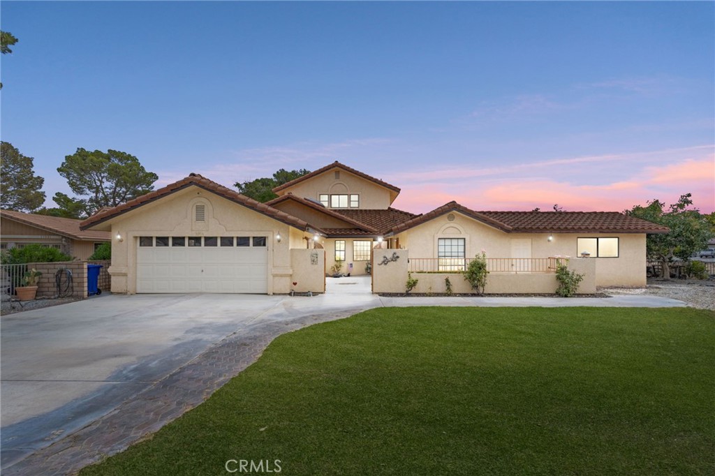Fantastic Golf Course Home on 1 North
Tucked away in a quiet cul-de-sac, this charming golf course home offers both comfort and convenience with beautiful views and thoughtful upgrades. The property features a two-car garage with wrought iron fencing, a separate golf cart garage, and a spacious front yard with a welcoming porch, rain gutters, and a tile roof.
Upon entry, a versatile bonus room awaits—perfect for a utility space, craft room, or even an additional cart shed. The foyer showcases rock flooring, leading into the home with a blend of LVP and carpet throughout.
The kitchen is bright and spacious, offering Formica counters, a gas cooktop, pantry, bar seating, a breakfast nook, and a skylight. Just off the kitchen, you’ll find an indoor laundry room with a sink for added convenience.
The large living room features a gas Heatilator fireplace and is wired for speakers, making it an inviting space for entertaining.
The first primary suite includes LVP flooring, a swamp cooler, a generous walk-in closet, and a spa-like bath with a jetted tub, upgraded tile shower, and matching counters. The second primary suite is also spacious, with direct access to the guest bath, complete with upgraded shower tile and a skylight.
Upstairs, a bonus room with an in-wall air conditioner leads to an additional bedroom with a half bath and a huge balcony overlooking the course.
The backyard is a true golfer’s paradise—featuring a covered patio, built-in BBQ, outdoor gardening closets, a private putting green, and mature pistachio, pomegranate, and grape trees.
This home blends functionality, comfort, and resort-style living—ideal for those who love golf and the outdoors.
