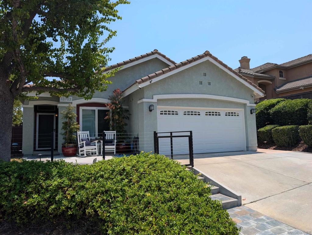 Discover this exquisite one-story home nestled in the highly sought-after Walden community of beautiful Carmel Mountain Ranch, served by the acclaimed Poway Unified School District. Boasting one of the best view lots in the neighborhood, this property offers breathtaking vistas that will captivate you from every angle. Step inside to a spacious, open-concept living floorplan flooded with natural light from abundant windows and soaring vaulted ceilings. The inviting living area features a custom built-in entertainment center and cozy fireplace, perfect for gatherings. Freshly painted interiors and newer exterior paint enhance the home's pristine appeal, while high-end upgrades throughout add a touch of luxury. The remodeled kitchen is a chef's dream, with upgraded cabinetry, fresh paint, an extended island ideal for entertaining, and ample storage space. Adjacent, the custom bathroom shines with elegant quartz counters. Retreat to the expansive master suite, complete with a generous walk-in closet and abundant storage options. Outside, the private gated front yard—designed by a professional landscape architect—provides a safe haven for children or pets, shaded by a mature tree. The widened driveway offers added convenience, and the backyard oasis includes small producing fruit trees (lemon, lime, orange, and apple) for fresh, homegrown delights. Relax under the custom Alumawood patio awning, equipped with lights and a fan to keep the breeze flowing. Smart home features abound, including a Nest doorbell and cameras, SimpliSafe alarm system, and custom security screens by Discover this exquisite one-story home nestled in the highly sought-after Walden community of beautiful Carmel Mountain Ranch, served by the acclaimed Poway Unified School District. Boasting one of the best view lots in the neighborhood, this property offers breathtaking vistas that will captivate you from every angle. Step inside to a spacious, open-concept living floorplan flooded with natural light from abundant windows and soaring vaulted ceilings. The inviting living area features a custom built-in entertainment center and cozy fireplace, perfect for gatherings. Freshly painted interiors and newer exterior paint enhance the home's pristine appeal, while high-end upgrades throughout add a touch of luxury. The remodeled kitchen is a chef's dream, with upgraded cabinetry, fresh paint, an extended island ideal for entertaining, and ample storage space. Adjacent, the custom bathroom shines with elegant quartz counters. Retreat to the expansive master suite, complete with a generous walk-in closet and abundant storage options. Outside, the private gated front yard—designed by a professional landscape architect—provides a safe haven for children or pets, shaded by a mature tree. The widened driveway offers added convenience, and the backyard oasis includes small producing fruit trees (lemon, lime, orange, and apple) for fresh, homegrown delights. Relax under the custom Alumawood patio awning, equipped with lights and a fan to keep the breeze flowing. Smart home features abound, including a Nest doorbell and cameras, SimpliSafe alarm system, and custom security screens by Progressive Security Screens for peace of mind, and rachio wifi automated sprinklers controls. The garage is equally impressive, with built-in cabinets, overhead storage, and durable Speedtile flooring. Best of all, owned solar panels transfer to the new owner, potentially eliminating your electric bill depending on usage. This turnkey treasure won't last long—