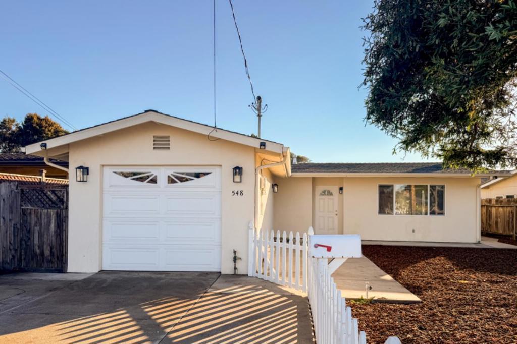 Home sweet home with a white picket fence. Welcome to 548 Hannon Avenue, Monterey, located within the convenient and sunny Villa Del Monte neighborhood.This beautiful and charming single level 3 bedrooms, 2 full bathroom home features 1268 sq. ft.The inviting living room with a cozy fireplace opens to a bright dining area and cheerful heart of the house central kitchen with a skylight. A primary bedroom suite features a walk in closet plus a glass sliding door to the backyard patio.The two additional bedrooms each with two closets offer the flexibility of living space for family, guests or a home office. A hallway bathroom and a hall closet. The enclosed backyard is perfect for creating a sanctuary for relaxing, gardening and entertaining. One car garage features a washer and dryer. You will enjoy coming and going with super convenient access to major roads and Highways. So nice to be near beaches, banking, pharmacies, dining, shopping, biking/walking trails along with all the amenities of the beautiful Monterey Peninsula.