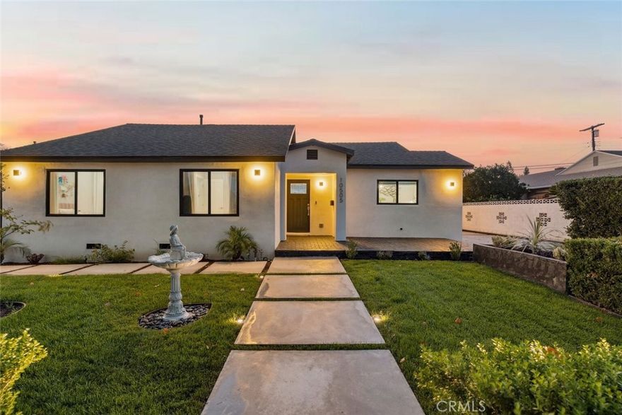 Welcome to this beautifully remodeled 4-bedroom, 2-bathroom single-family home offering 1,438 sq ft of comfortable living space on a generous 7,505 sq ft lot, plus an additional bonus 350 sq ft studio with its own full kitchen and bathroom—bringing the total living area to approximately 1,800 sq ft with 5 bedrooms and 3 bathrooms combined. Thoughtfully updated from top to bottom, the main residence blends modern convenience with timeless comfort, perfectly suited for today’s lifestyle. Step inside to find luxury vinyl plank flooring, solid wood doors and trim, and smooth drywall with fresh interior paint throughout. The home has been fully re-piped with Copper and PEX, includes a new gas and drain system (completed in 2020), and features updated electrical wiring with a new panel for added safety. Enjoy year-round comfort with a new HVAC system and ducting (2021), Rockwool insulation for temperature and sound control, and dual pane windows (2021) that fill the home with natural light. The kitchen and bathrooms have been tastefully renovated—kitchen in 2022 and bathrooms in 2021—each showcasing quality finishes and thoughtful design. The primary bathroom includes a zero-threshold shower that is steam-shower ready, adding a touch of modern luxury. Adding to the home’s appeal is the converted studio addition, a private living space complete with its own kitchen and bathroom. Perfect for guests, extended family, or potential rental income, this versatile approximately 350 sq ft area provides comfort and independence while complementing the main home. Additional upgrades include a new roof and fascia (2023), smooth stucco exterior (2022), tankless water heater with whole-house filtration system (2022), and refreshed front and backyard landscaping (2025), creating an inviting setting for outdoor entertaining. The detached two-car garage has also been updated with a new garage door and motor (2023) and a Tesla charger for EV convenience. With every system and finish thoughtfully modernized, this turnkey property delivers comfort, efficiency, and style in one of the most desirable neighborhoods.