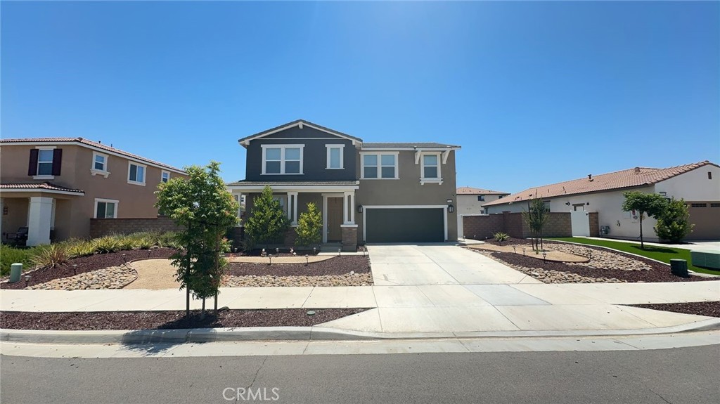 Stunning 4-Bedroom Home with Loft & Designer Backyard in Menifee Town Center! Welcome to this exceptional 4-bedroom, 3-bathroom residence with a spacious loft, located in the highly desirable community of Menifee Town Center—a neighborhood that offers both comfort and convenience with nearby shopping, dining, parks, and community amenities including pool! Interior Highlights: Step into a formal entryway adorned with a stylish accent wall, setting the tone for the tasteful design throughout. The open-concept kitchen is a chef’s dream, featuring a large center island with bar seating, rich granite countertops, black and stainless steel appliances, and a walk-in pantry. Perfectly designed for entertaining, the kitchen flows effortlessly to the back patio and opens to a light-filled family room with expansive windows. A main-level bedroom and full bathroom with a walk-in shower and modern square sink provide ideal space for guests or multi-generational living. Upstairs, enjoy a massive loft that can be transformed into a playroom, home theater, office, or additional living space—endless possibilities! The luxurious primary suite is your private retreat with an en suite bath offering a large walk-in shower, dual sink vanity, privacy door, and a huge walk-in closet. Two additional upstairs bedrooms are generously sized, one with a walk-in closet, and share a well-appointed guest bathroom with dual sinks and a separate tub/shower area. The laundry room includes upper cabinets and built-in shelving for extra convenience. Upgrades & Design Features: Gorgeous LVP-style flooring throughout / Recessed lighting and modern ceiling fans / Elegant light fixtures, high ceilings, and raised panel doors / Custom designer touches for added warmth and style. Outdoor Living: Enjoy a huge backyard designed for relaxation and entertainment—featuring a large deck, a charming gazebo structure ready for curtains or shades, and a walkway leading to a fire pit seating area—perfect for hosting gatherings under the stars. Fully fenced with block wall and vinyl fencing for privacy and security.
Low-maintenance landscaping and a welcoming front porch to enjoy those peaceful afternoon breezes. Spacious 2-car garage. Community Perks: Access to association pool, parks, and beautifully maintained common areas. Don’t miss this rare opportunity to live in a beautifully upgraded home in one of Menifee’s most sought-after communities.
