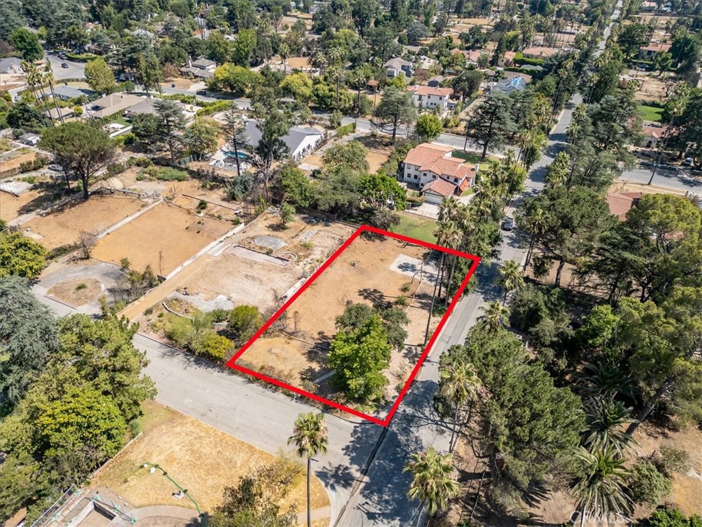Prime Location! This 12,682 sqft corner lot offers an exceptional development opportunity just north of Altadena Drive and west of Allen Avenue. Recently cleared by the U.S. Army Corps of Engineers and with the EPA Phase1 Environmental removal completed, the property is ready for your next project. The previous 2,404 sqft home, lost in the Eaton Fire, had fully functional sewer, gas, electricity, and water prior to the fire. Buyers are strongly advised to independently verify the current status of all utilities, as well as zoning, permitting, environmental, and rebuilding requirements. The corner location may allow for a detached ADU with separated access (buyer to verify with County of LA). Nestled on a small cul-de-sac with stunning mountain views, this property is being sold “as is” for land value.
