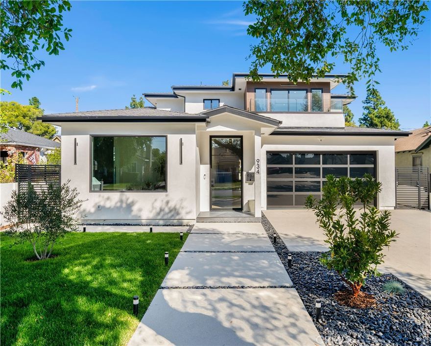 Discover modern luxury in this BRAND NEW, meticulously crafted home. Designed with elegance and functionality in mind, this four-bedroom, three-bathroom home welcomes you in with distinct architectural features that will make a lasting first impression. A grand entrance to the formal Living Room with a floor to ceiling stone feature and oversized picture window brings in brightness and warmth. The heart of the home is the expansive open concept Kitchen, Dining and Family room area, perfect for everyday living and comfortable entertaining. The Chef’s Kitchen makes a statement with high-end appliances, Taj Mahal quartzite stone, an abundance of cabinetry, hidden walk-in pantry and nearby wine closet to showcase your collection. Upstairs you’ll find the Primary Suite complete with a spa inspired bathroom that features a soaking tub and oversized shower, private balcony, lounge space, and a walk-through closet. Seamless indoor-outdoor California living is ready to be enjoyed with a spacious outdoor patio and BBQ area, ideal for hosting gatherings in style. With impeccable craftsmanship, premier finishes and thoughtful floor plan, this home is waiting for you to make it your own!